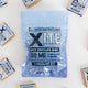 close up of a bag of 150mg milk chocolate minis by xite