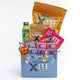 an unwrapped giftbag of various xite edible products